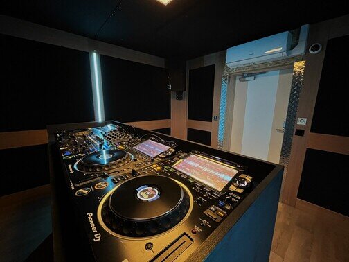 Triple deck DJ studio with CDJ-3000 and DJM A-9